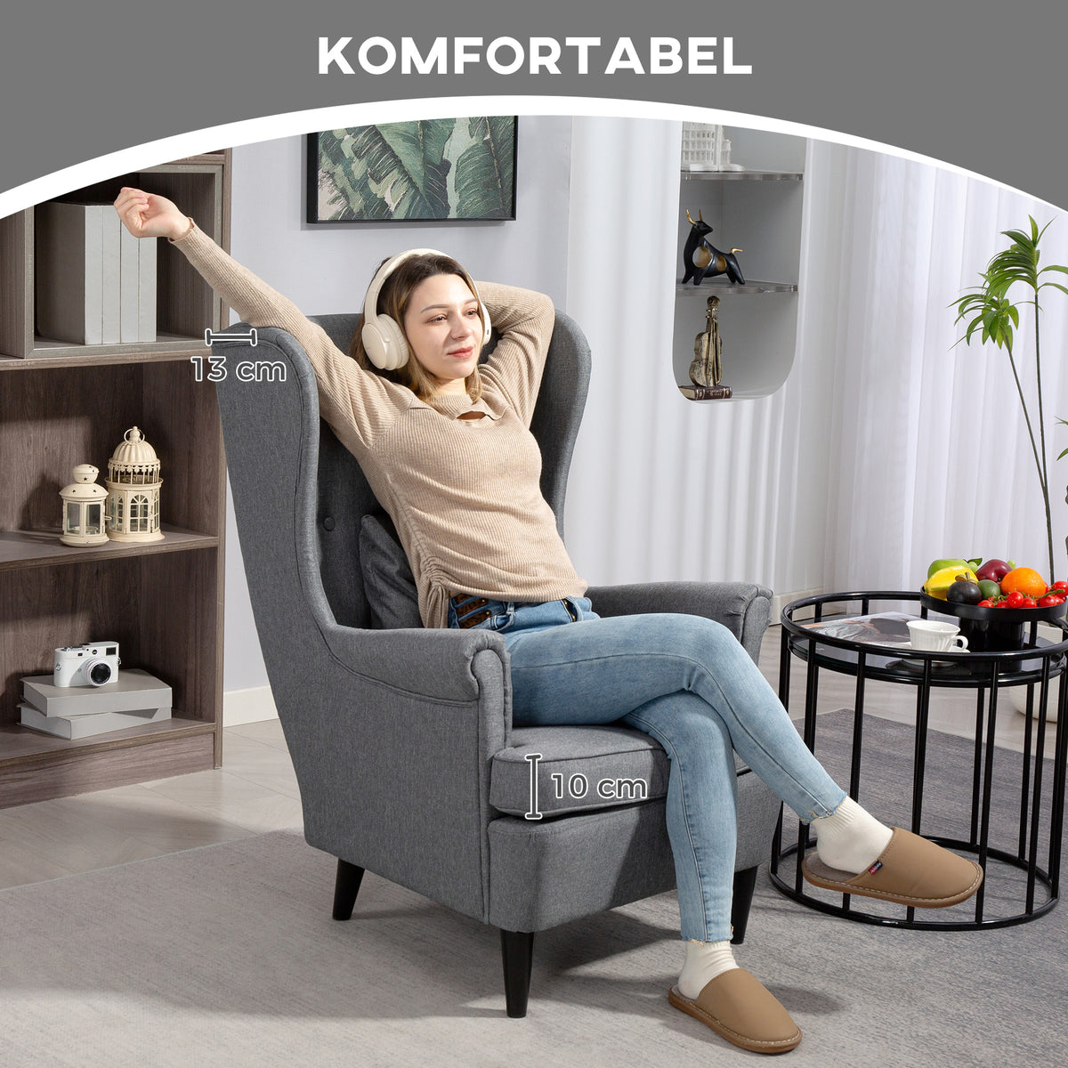 Ohrensessel mit Fußhocker und Knopfheftung