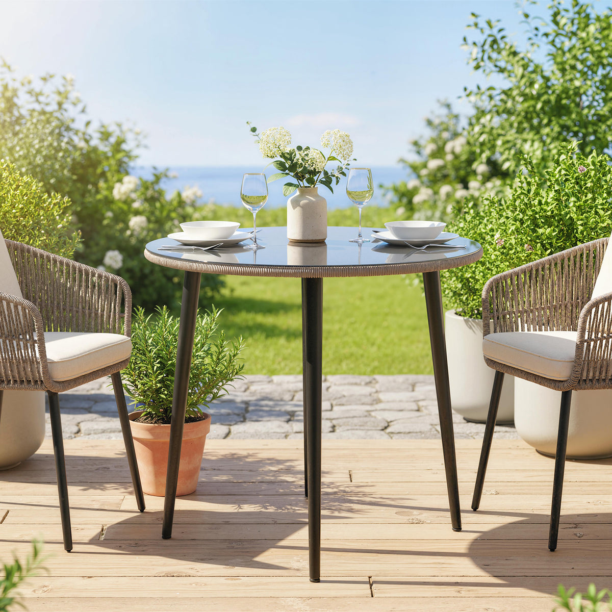 Runder Gartentisch aus Stahl mit Glasplatte